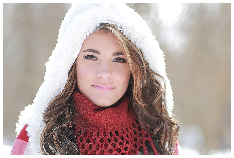 girl in snow fuzzy white cap