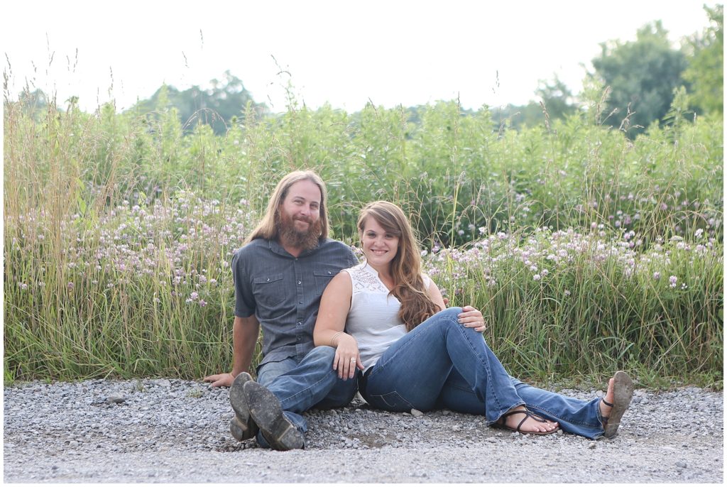 engagement photos flowers and dirt road